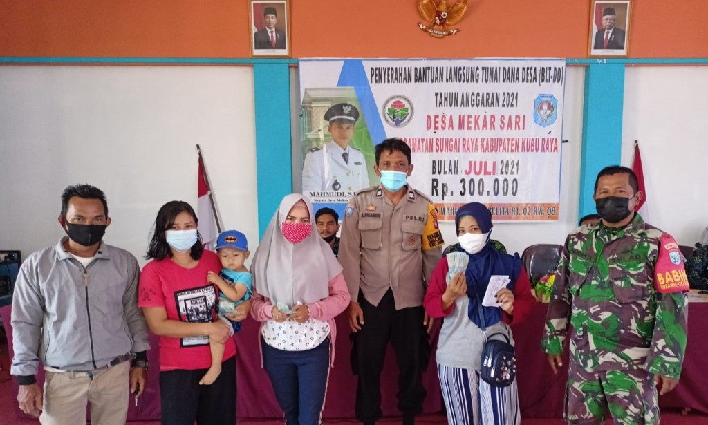Bhabinkamtibmas Mekar Sari kawal Penyaluran BLTDD
